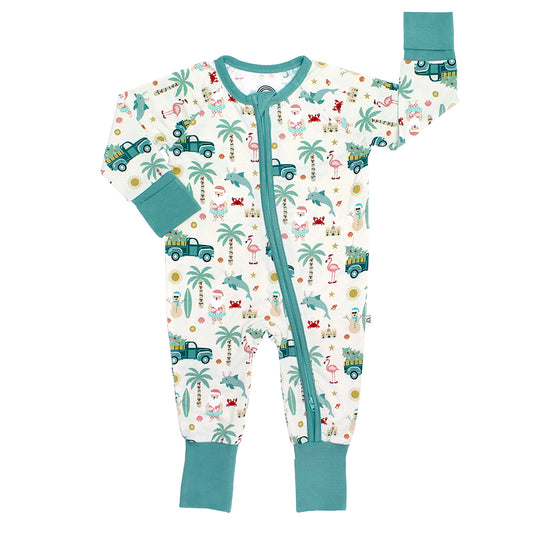 Children's onesie with tropical pattern and teal zipper on a white background