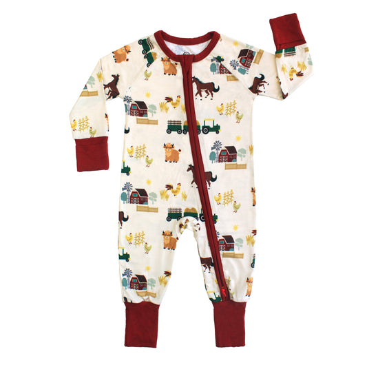 On the Farm bamboo convertible baby pajamas with horses, highland cow, tractor, and barnyard print.