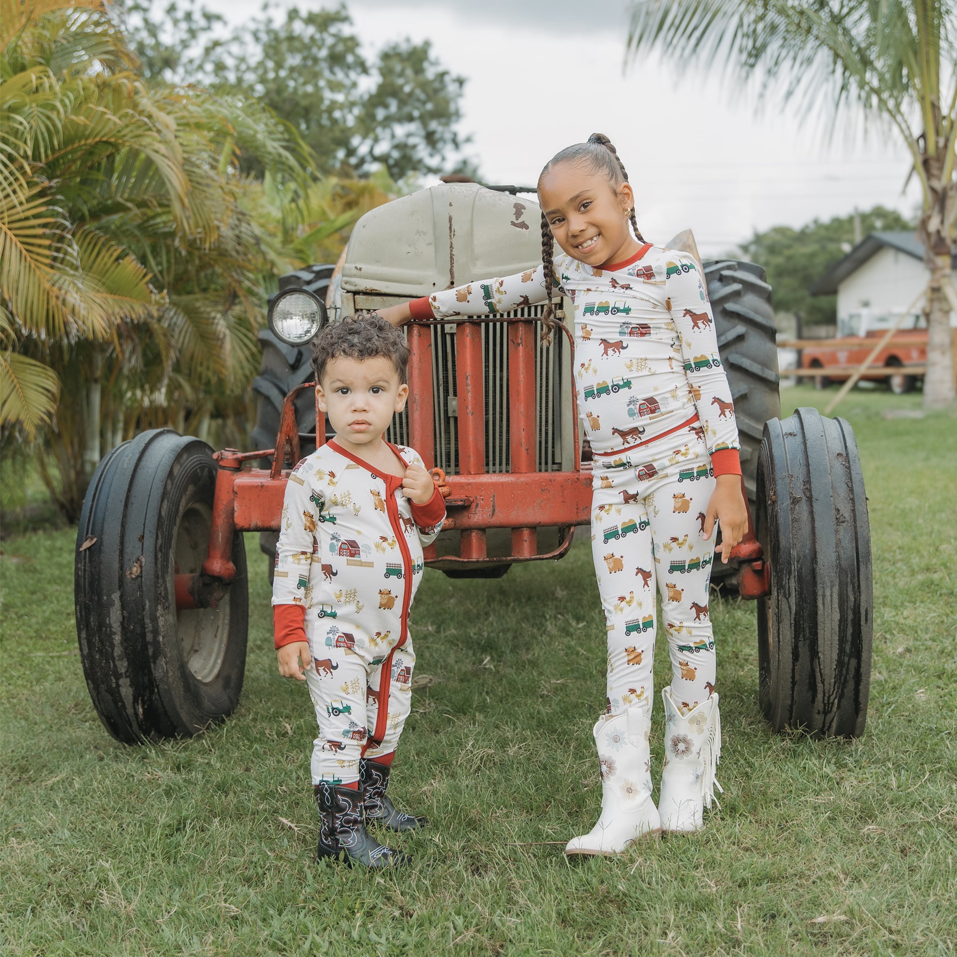 On the Farm bamboo kids pajama pants set with playful farm print of horses, cows, and tractors.