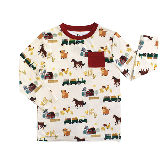 On the Farm bamboo long sleeve pocket tee with red chest pocket and farm print, soft, breathable, and hypoallergenic for sensitive skin.