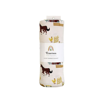 Packaged On the Farm luxury bamboo blanket with tractor and horse barnyard print, soft, breathable, and hypoallergenic fabric.