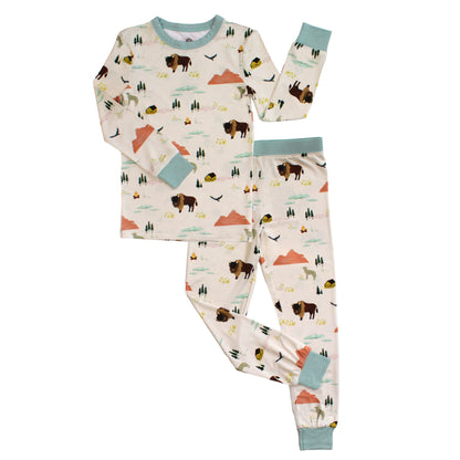 Children's pajama set with nature-themed design on a white background