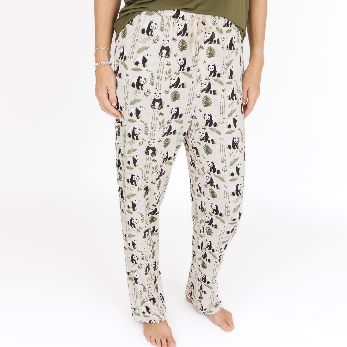 Pajama pants with panda and bamboo pattern on a white background