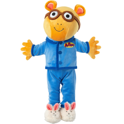 A plush toy of Arthur, the animated aardvark, wearing blue pajamas with bunny slippers and large glasses, smiling with outstretched arms.