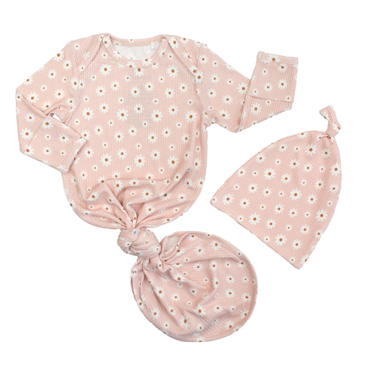 Baby outfit set with pink floral pattern including a long-sleeve shirt, turban, and headband on a white background.