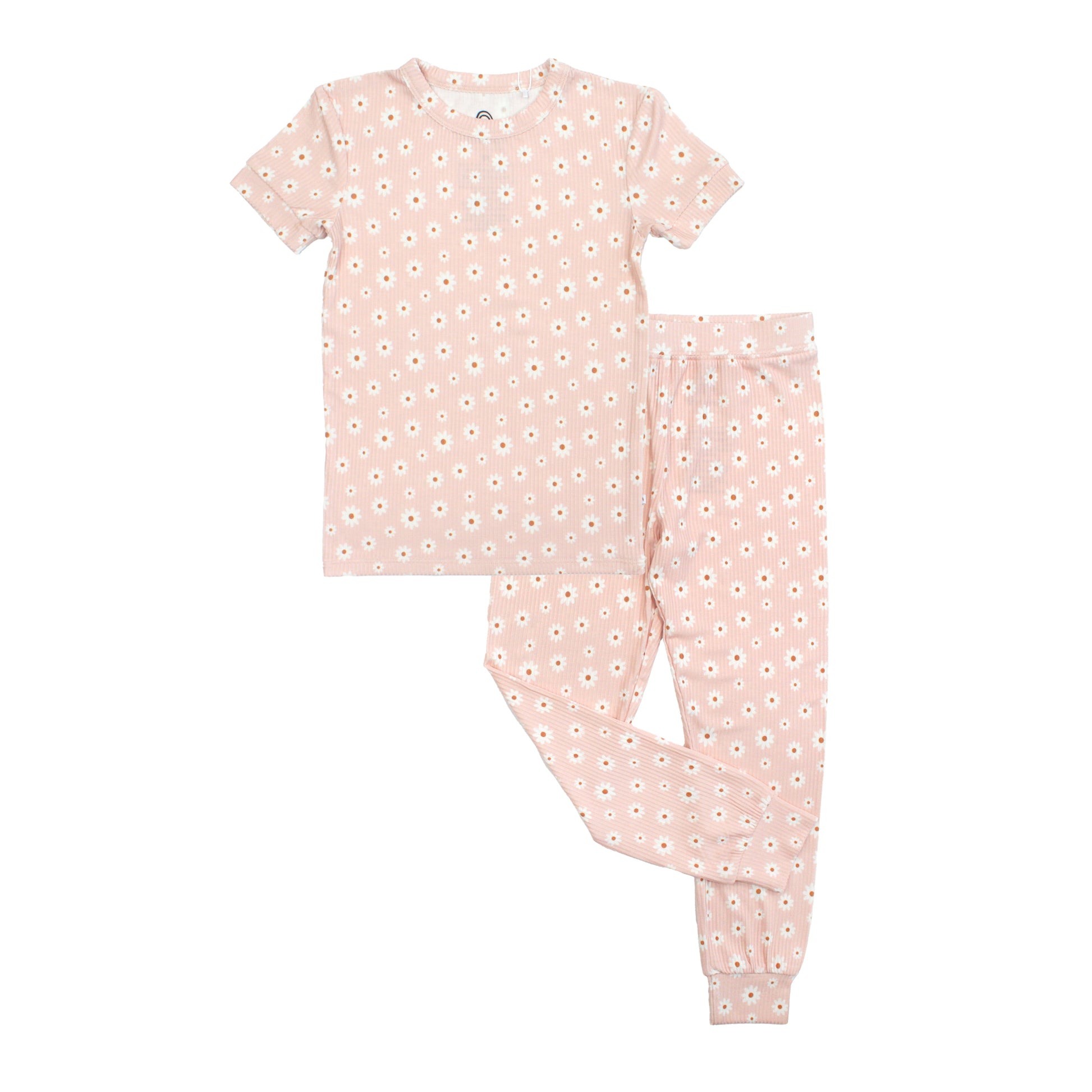 Pink children's pajama set with white floral pattern on a white background