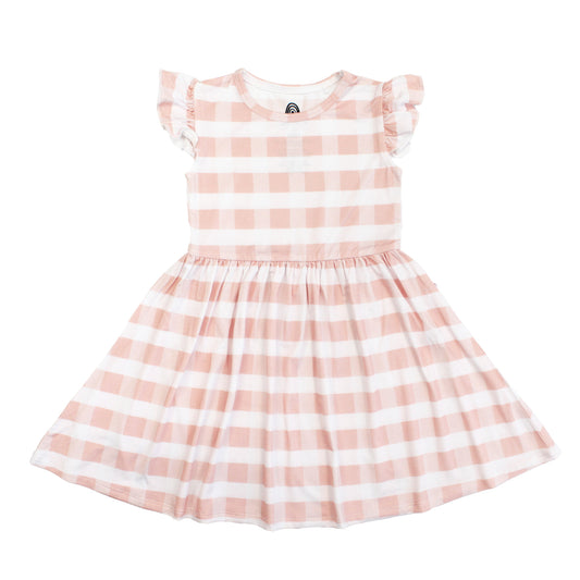 Girls short sleeve bamboo twirl dress featuring a classic pink and white gingham checkered pattern.