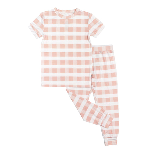 Pink Gingham Bamboo Kids Pajama Set in flat lay in white background 