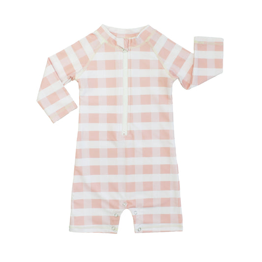 Pink and white checkered baby romper with matching hat on a white background