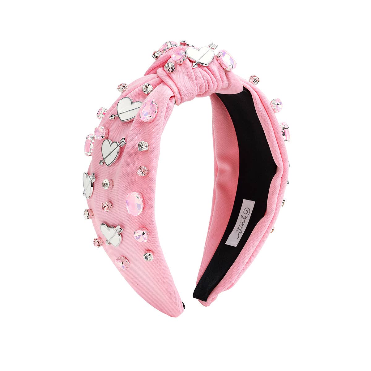 Pink headband with decorative elements on a white background