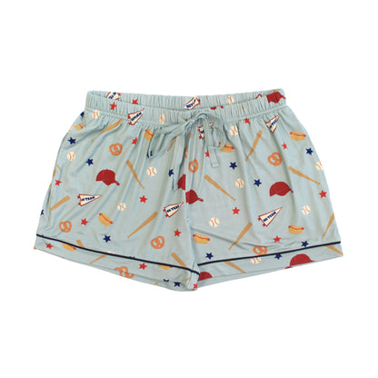 Light blue shorts with sports-themed pattern on a white background