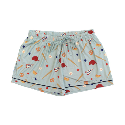Light blue shorts with sports-themed pattern on a white background