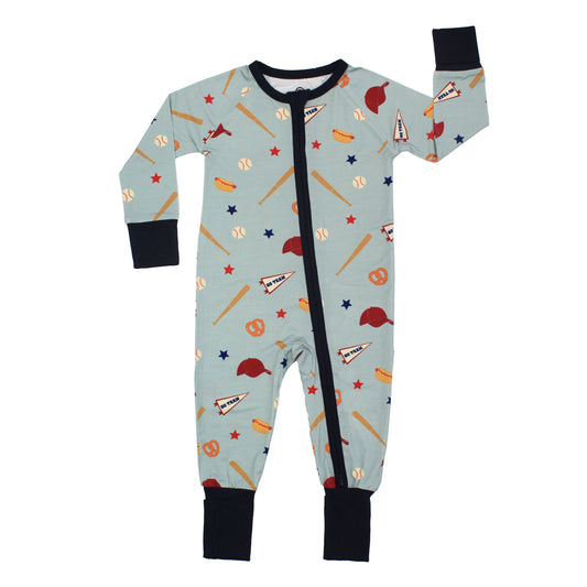 Children's onesie with sports-themed pattern on a light blue background