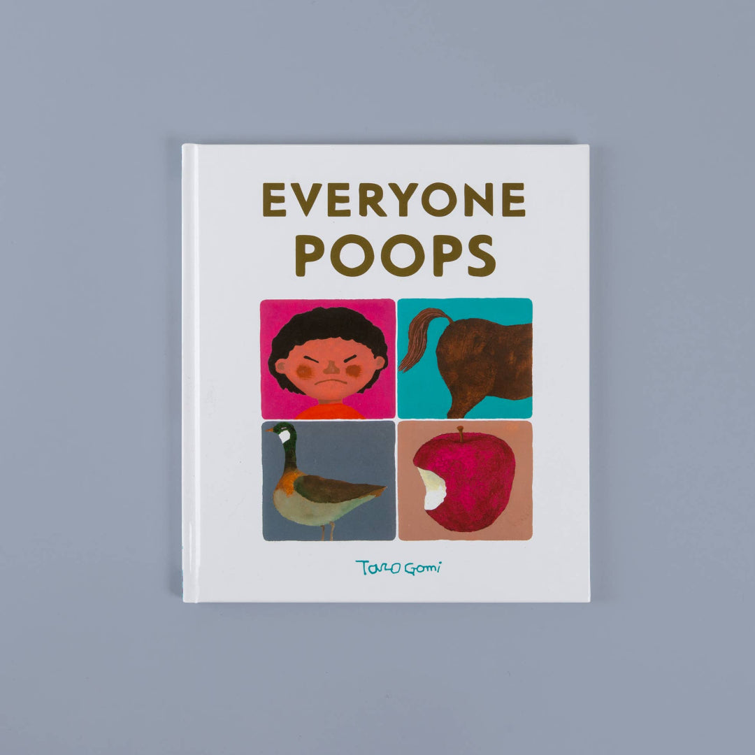 Book titled 'Everyone Poops' with illustrations on a gray background