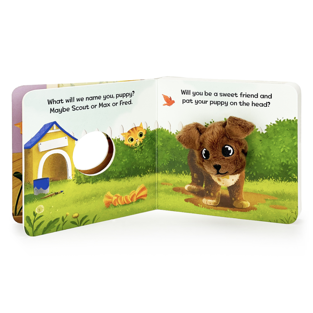 Brown dog finger puppet in a board book with a multi-colored outdoor scene