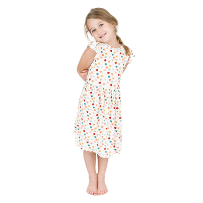 Child wearing Rainbow Hearts bamboo short sleeve twirl dress.