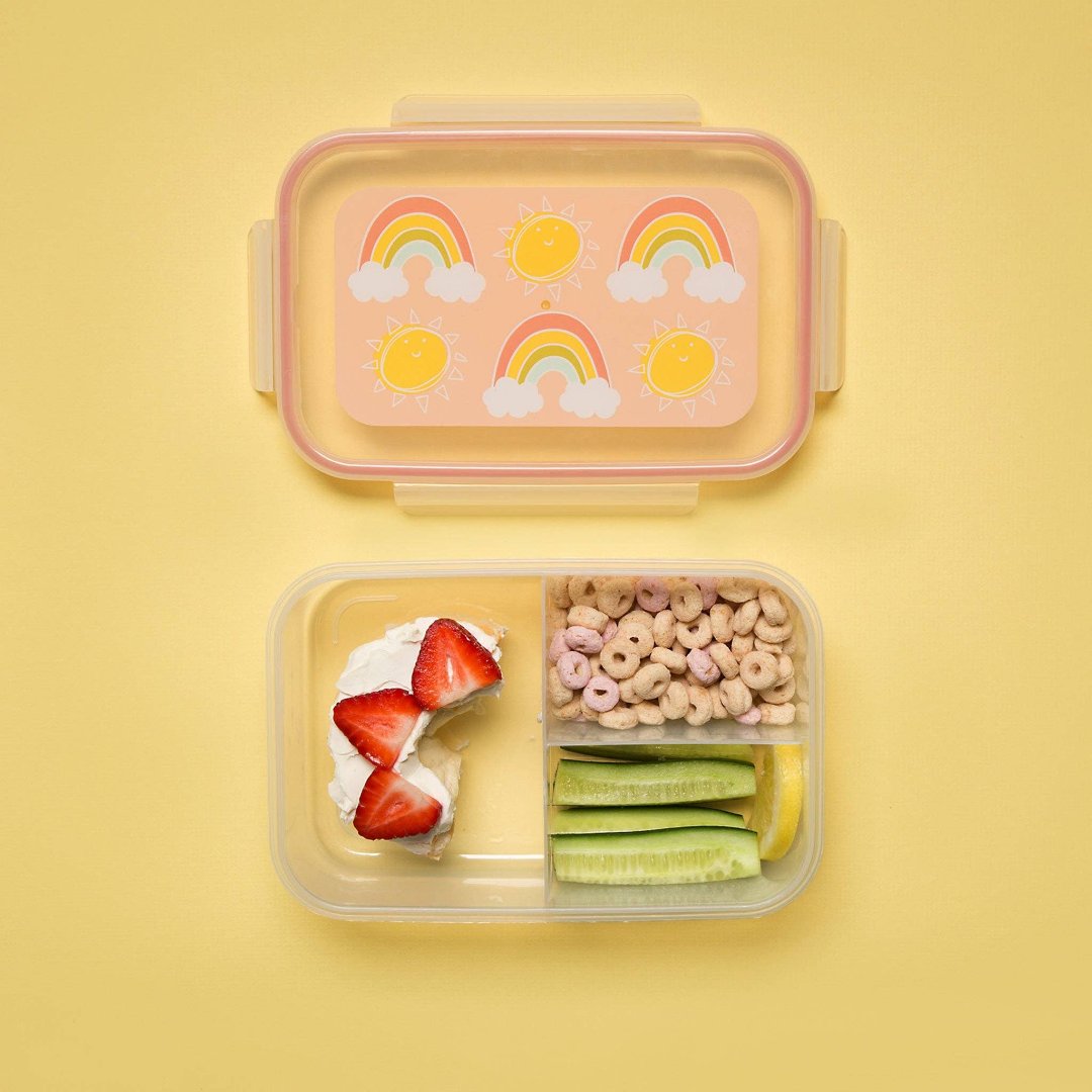 bento box opened with food inside so you can see all 3 compartments