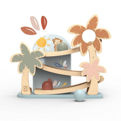 wooden pastel colored ramp toy with a monday and palm trees on the ramp, and 3 balls that roll down the ramps