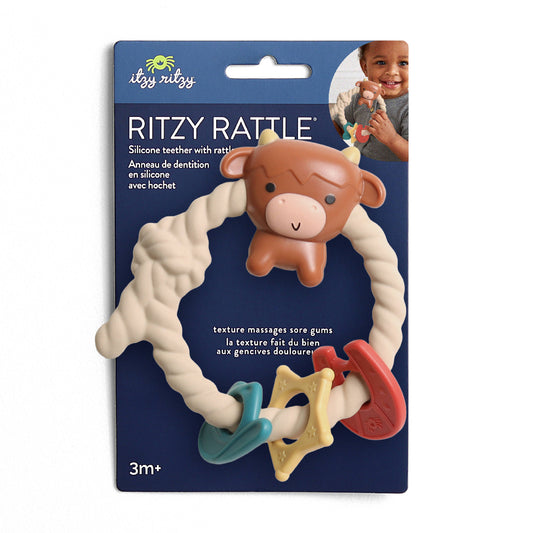 baby rattle with a highland cow on the top