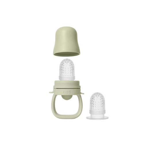 Green baby feeder with two silicone teats on a white background