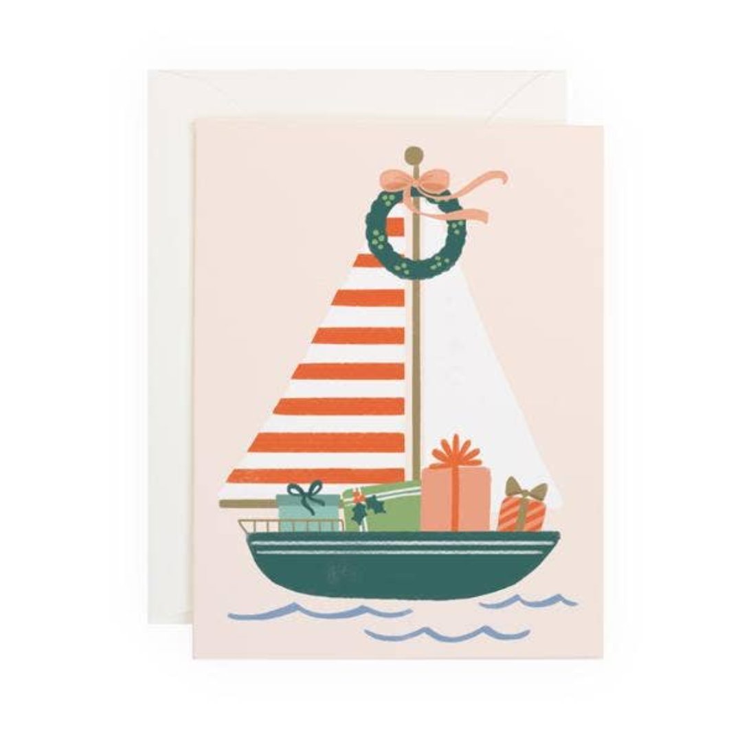 sailboat with christmas wreath and presents holiday card