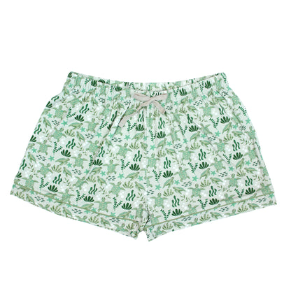 Save the Sea Turtles women's bamboo pajama shorts by Emerson and Friends. Featuring a soft sea-green background with hand-drawn turtles, seaweed, and starfish, these eco-friendly shorts are designed for ultimate comfort and sustainability.