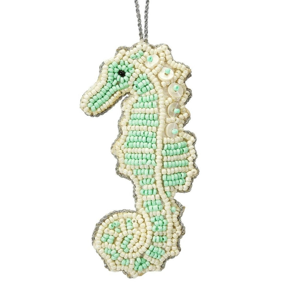 seahorse ornament made out of green and beige beads