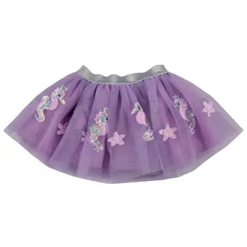 purple tutu with seahorses and starfish on it