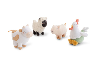 Set of four small plush toys representing different farm animals on a white background