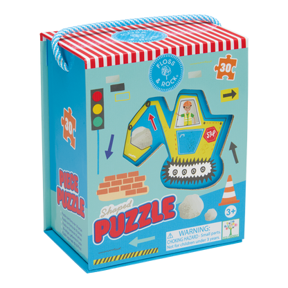 Children's puzzle packaging with a construction vehicle design on a white background