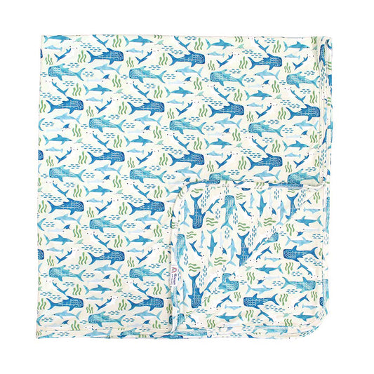 Flat lay image of our Shark Friends Bamboo Blanket. 