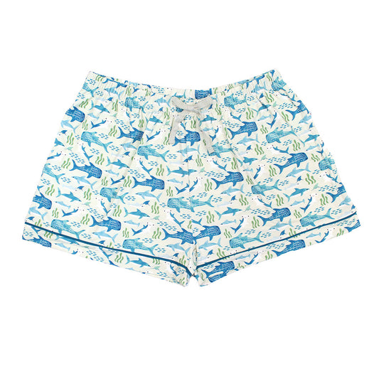 Flat lay image of our Shark Friends Women's Bamboo Pajama Shorts. The print features schools of fish, seaweed, and different types of sharks.