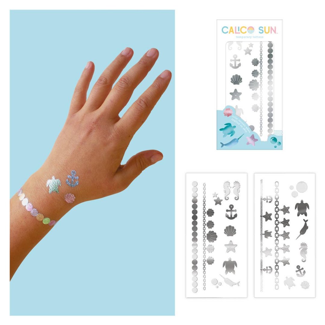 temporary tattoos with beach theme and change color when applied to your skin