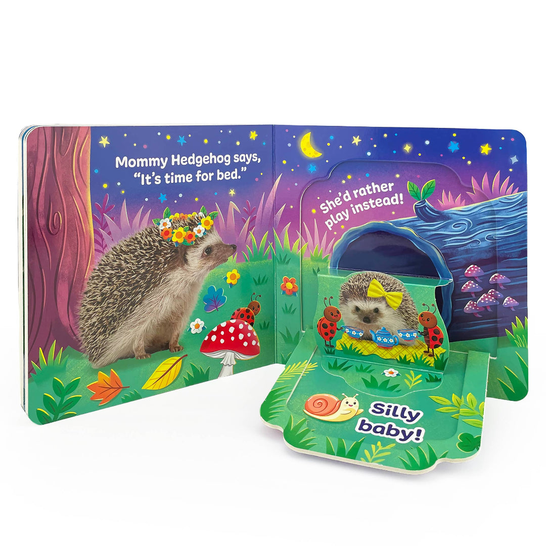 inside of the silly animal board book with a page open to a hedgehog and a pull down flap with a baby hedgehog hiding