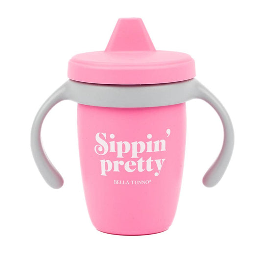 pink sippy cup that says sippin pretty