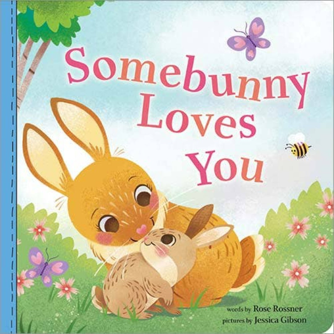 Colorful book with two rabbits, a bee, and a butterfly