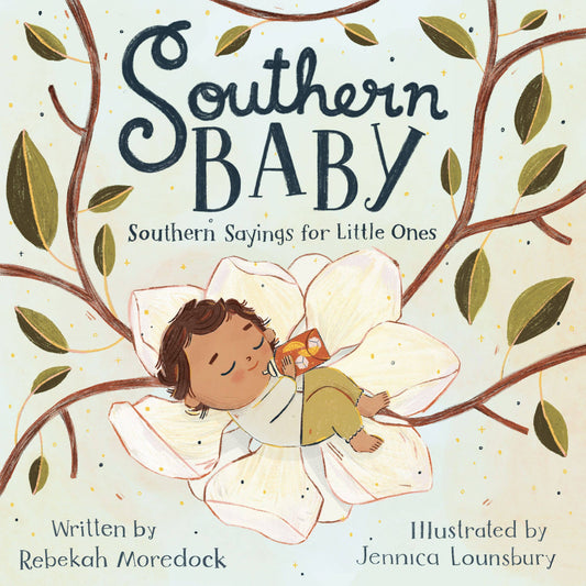a book called southern baby with a baby sleeping on a flower