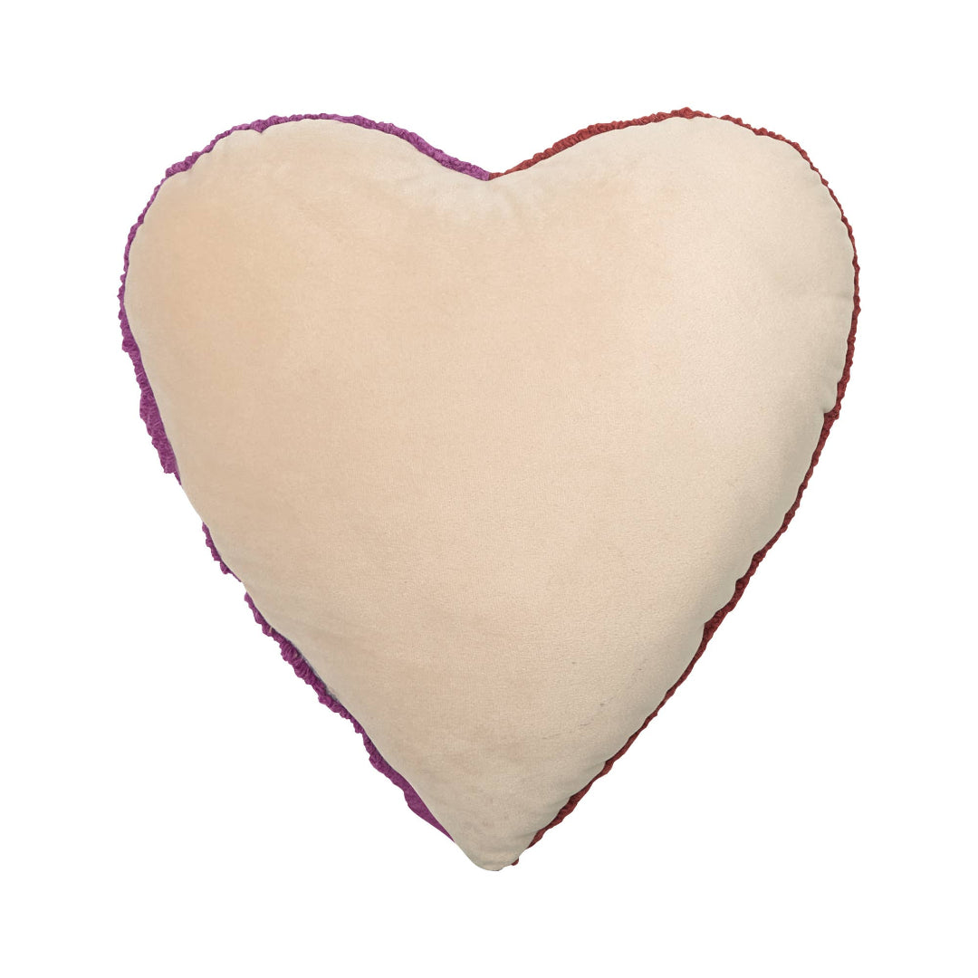 back side of heart shaped pillow thats plain cream colored