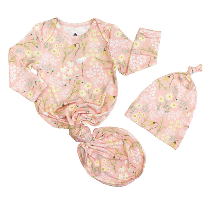 Baby outfit set with floral pattern on a white background