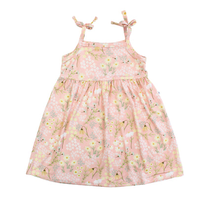 Pink floral dress with thin straps on a white background