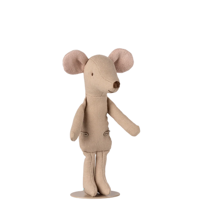 Stuffed toy mouse in a beige outfit on a white background