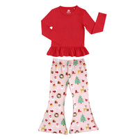 Flat lay of Sugar Plum bamboo kids flare pants set with festive print bottoms and red ruffle top, perfect for the holidays.