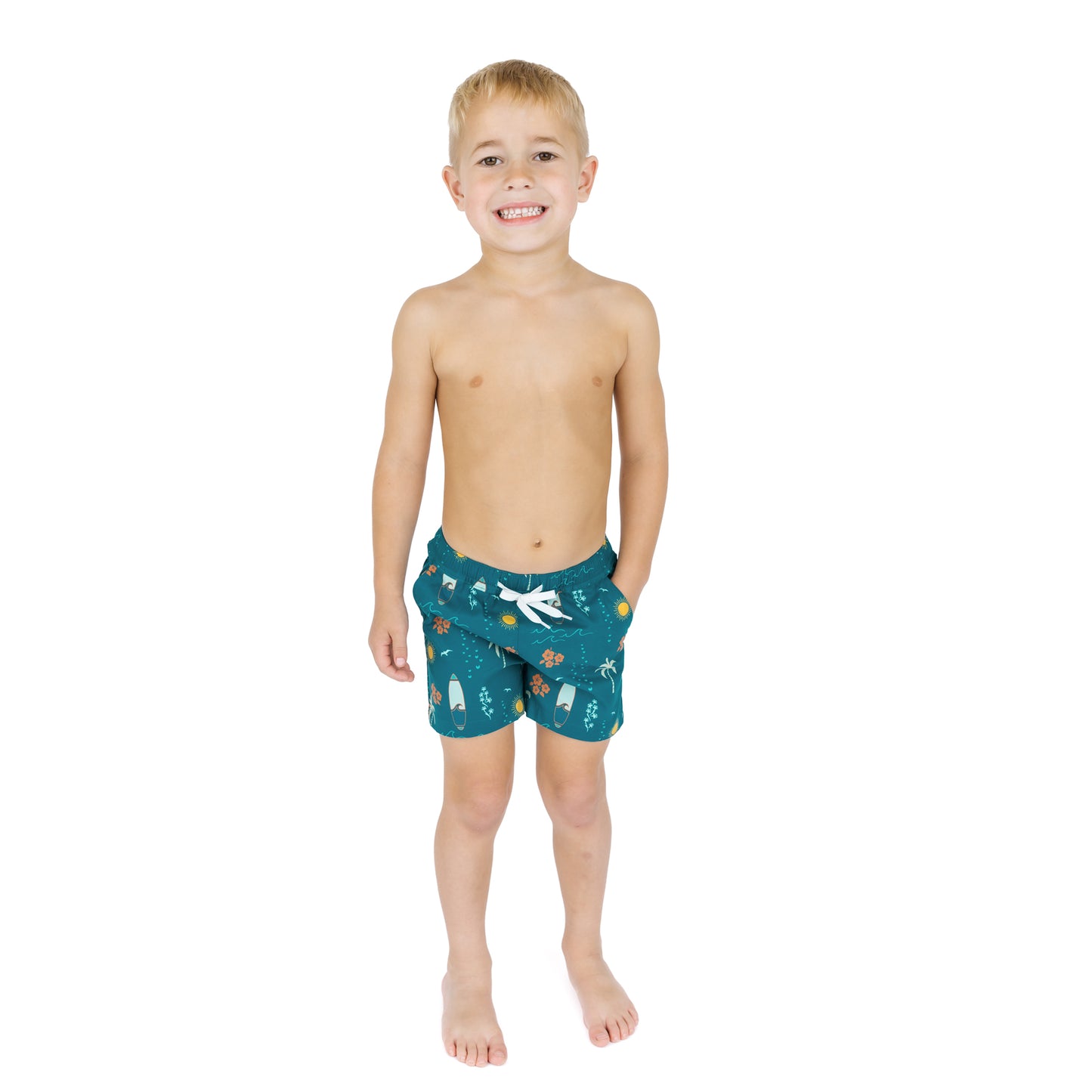 Child wearing Surf’s Up swim trunks full body view