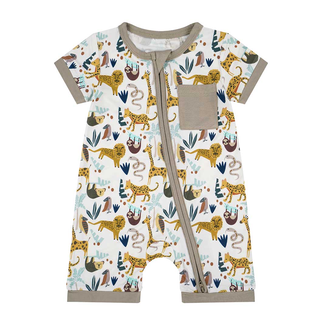 the "jungle friends" shortie romper. the "jungle friends" print is a mix of jungle animals that include giraffes, lions, cheetahs, sloths, snakes, and forest plants. 