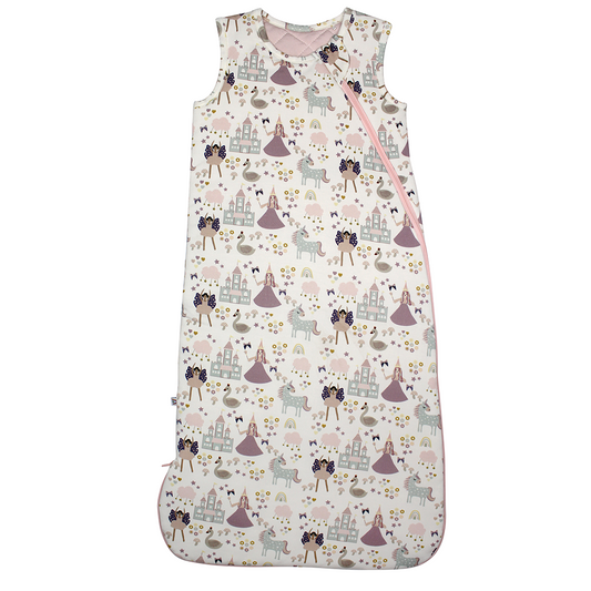 the "once upon a time" baby bag. the "once upon a time" print is a mix of pinks, purples, whites, blues, and yellows. you can see fairy princess and regular princess, unicorns, swans, and castles. theres also hearts, stars and sparkles scattered around the print. 