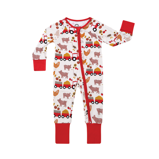 the "farm friends" bamboo convertible. the "farm friends" print is a collection of chickens, roosters, pigs, bails of hay, tractors, chicks, apples, and pumpkins. it's a white background and flashed of reds, yellows, and oranges, to bring out the farm aesthetic.