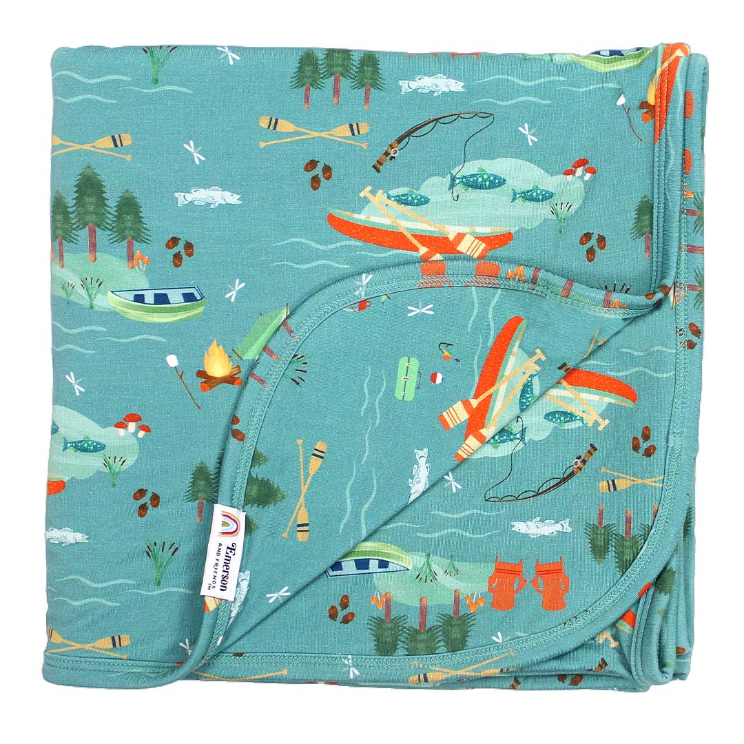 the "jump in the lake" bamboo blanket. the "jump in the lake" pattern is a print to capture the day in the life on a lake. you can fine fishing poles, tents, camp fires, adirondack chairs, marsh mellows, ores, canoes, forest trees, and different types of fish and fishing gear.