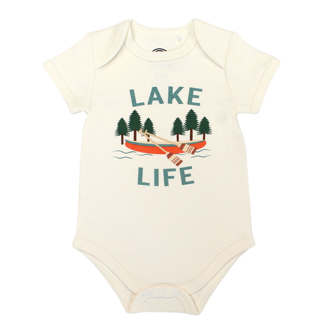 the "lake life" cotton onesie. this design says the phrase "lake life" and has a canoe, ores, oak trees, and some lake waves. 