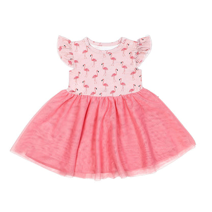 the "fancy flamingos" twirl dress. this features the "fancy flamingos" print on the top half, and a bright pink bottom half of the dress. the "fancy flamingos" print is a pattern of multiple pink flamingoes scattered around the print. 