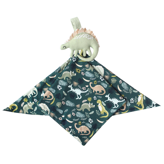 the "prehistoric friends" lovey is a "prehistoric friends" printed blanket, with a dinosaur attached at the top. the "prehistoric friends" print is a mix of cute dinosaurs, eggs, and branches, all scattered on a dark green background.